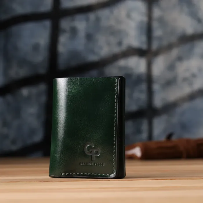 Відмінний гаманець у три складання з натуральної гладкої шкіри GRANDE PELLE 22944 Зелений