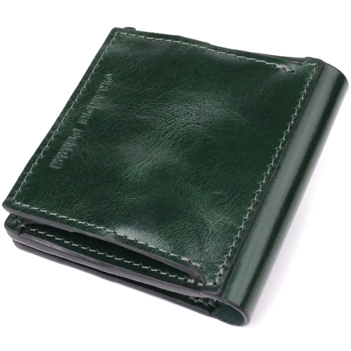 Компактний гаманець у дві складення з натуральної гладкої шкіри GRANDE PELLE 22946 Зелений