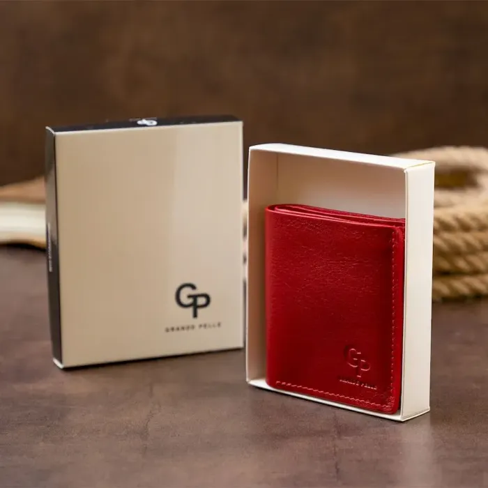 Вертикальне глянсове портмоне з накладною монетницею GRANDE PELLE 11331 Червоне