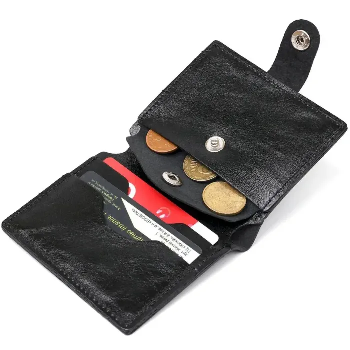 Чоловічий глянсовий шкіряний портмоне Shvigel 16481 Чорний