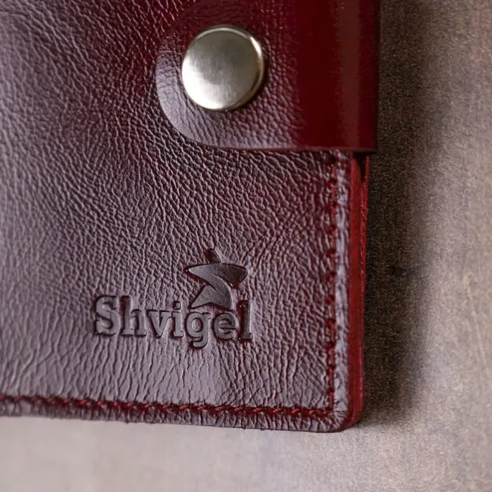 Класичне шкіряне портмоне Shvigel 16505 Бордовий