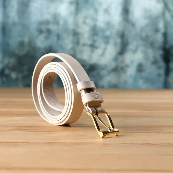 Красивий тонкий шкіряний ремінь для жінок GRANDE PELLE 22949 Молочний