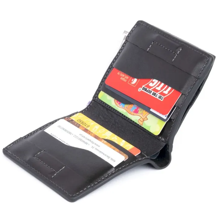 Вертикальне глянсове портмоне з накладною монетницею GRANDE PELLE 11329 Чорне