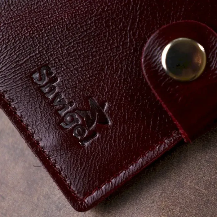 Женское глянцевое кожаное портмоне Shvigel 16484 Бордовый