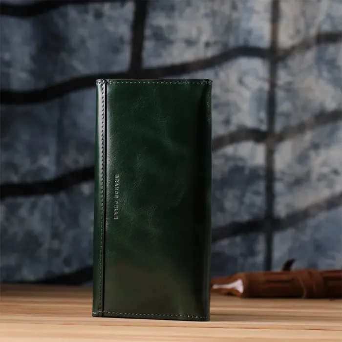 Добротний гаманець у два складення з натуральної гладкої шкіри GRANDE PELLE 22945 Зелений