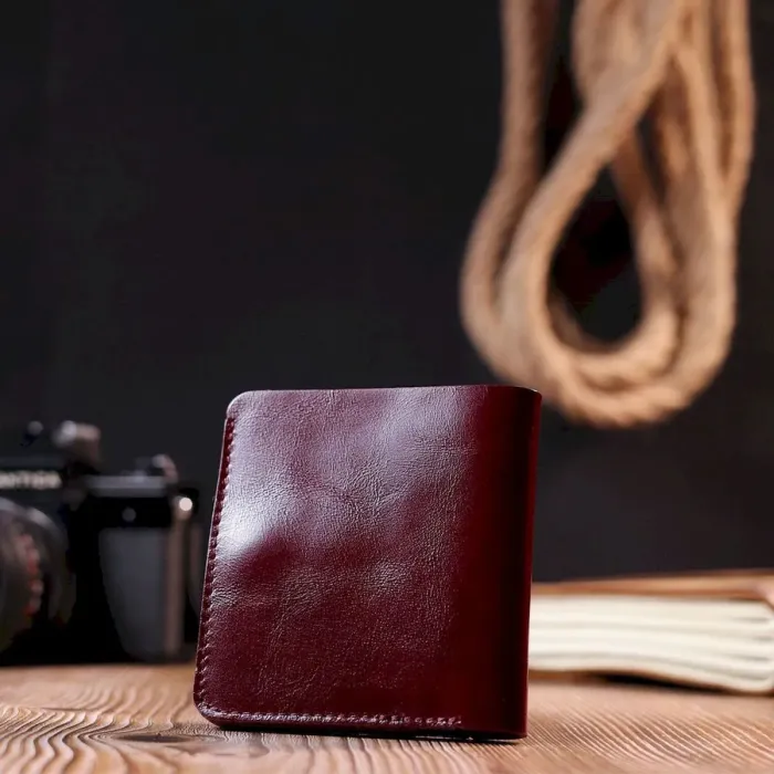 Жіноче глянсове шкіряне портмоне Shvigel 16609 Вишневий