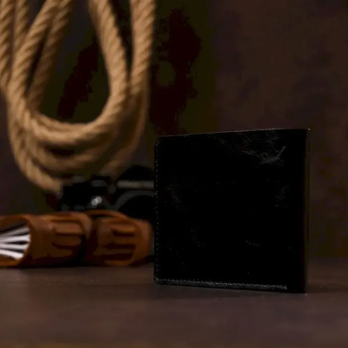 Невеликий шкіряний портмоне для чоловіків Shvigel 16460 Чорний