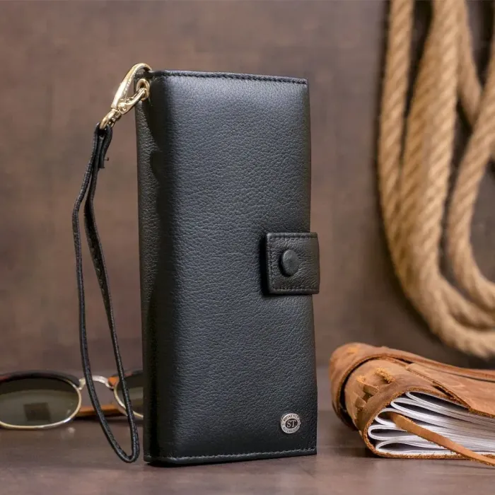 Оригінальний гаманець шкіряний жіночий на хлястиці з кнопкою ST Leather 19280 Чорний