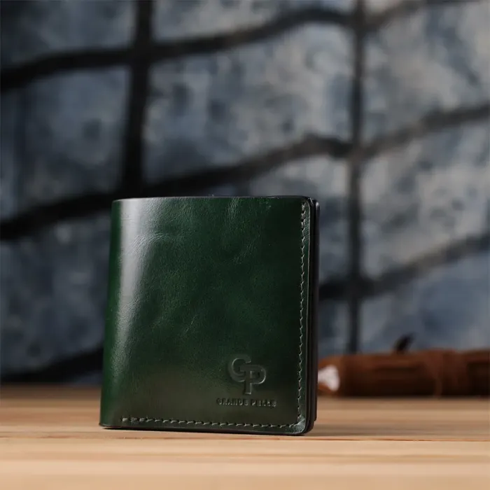 Компактний гаманець у дві складення з натуральної гладкої шкіри GRANDE PELLE 22946 Зелений
