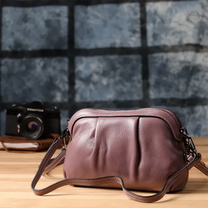 Цікава жіноча шкіряна сумка з ефектним драпіруванням Vintage 22898 Пурпурний