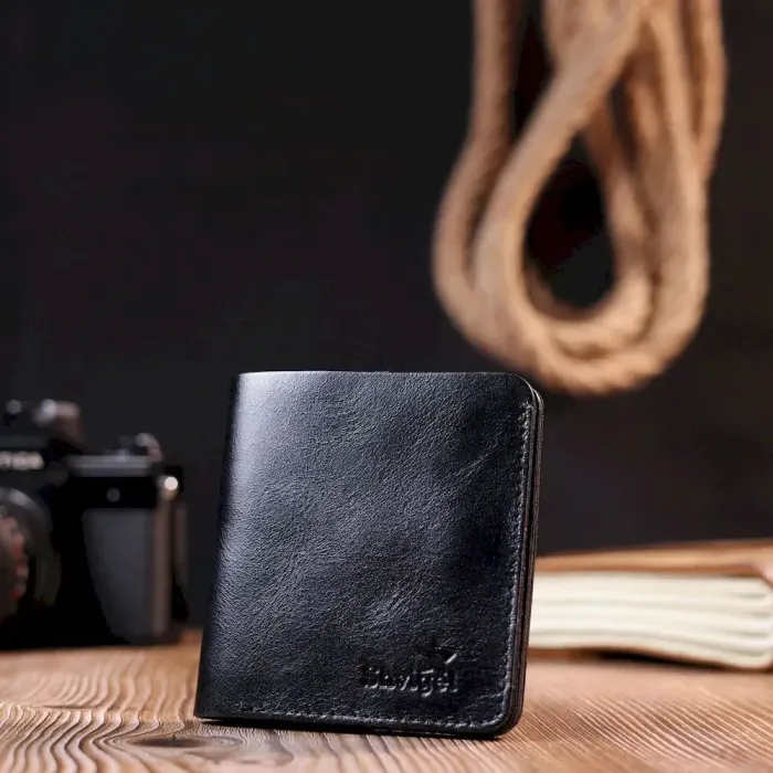 Невеликий шкіряний портмоне для чоловіків Shvigel 16606 Чорний