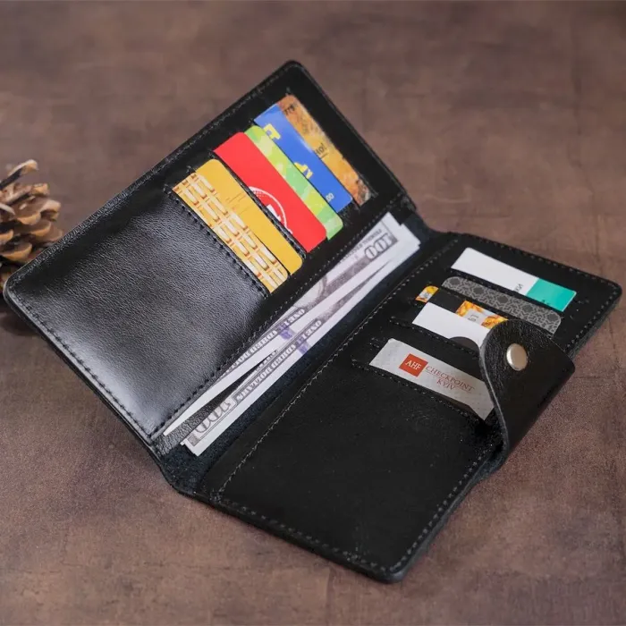 Гаманець чоловічий вертикальний зі шкіри алькор на кнопках SHVIGEL 16173 Чорний