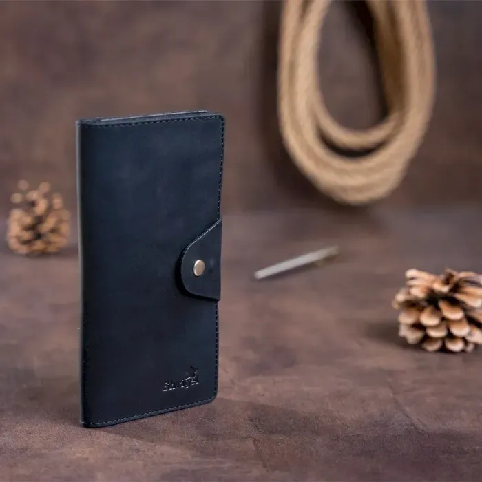 Бумажник мужской вертикальный из винтажной кожи на кнопках SHVIGEL 16182 Черный