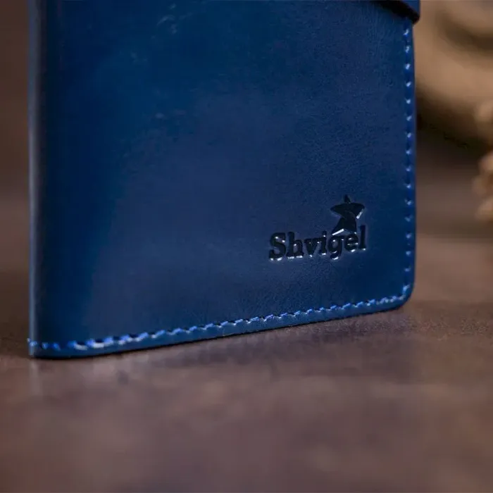 Гаманець унісекс вертикальний зі шкіри алькор на кнопках SHVIGEL 16174 Синій