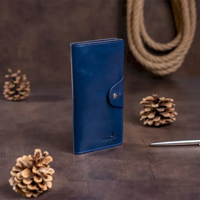 Гаманець унісекс вертикальний зі шкіри алькор на кнопках SHVIGEL 16174 Синій