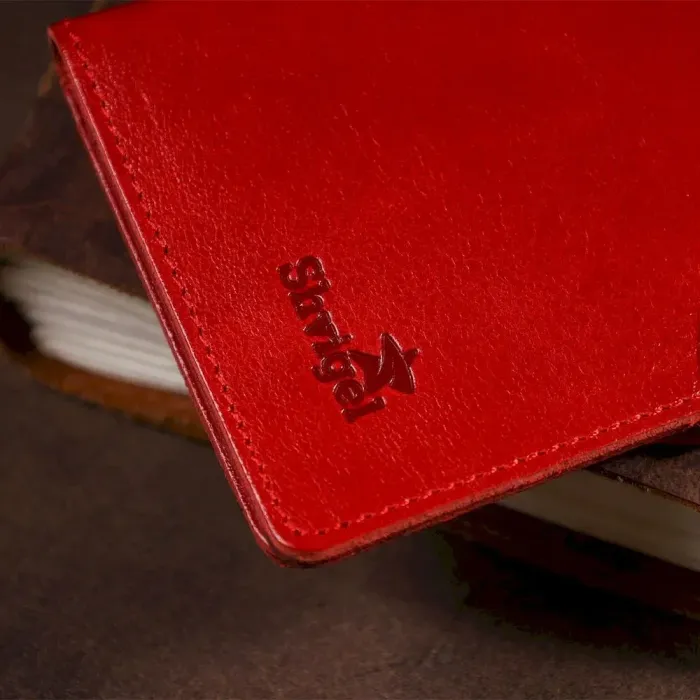 Бумажник женский вертикальный из кожи алькор на кнопках SHVIGEL 16172 Красный