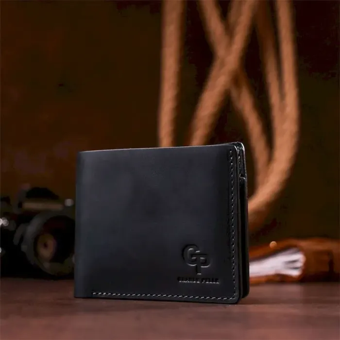 Функціональне портмоне унісекс на магніті GRANDE PELLE 11206 Чорне