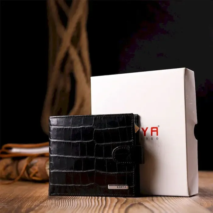 Горизонтальное узкое портмоне с хлястиком из натуральной фактурной кожи под крокодила KARYA 21089 Черный