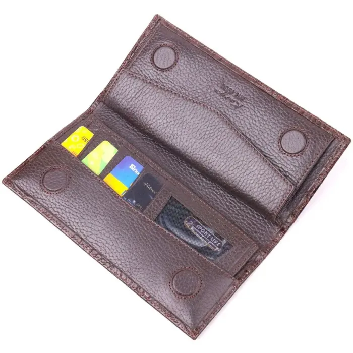 Интересный вертикальный бумажник из натуральной фактурной кожи KARYA 21434 Коричневый