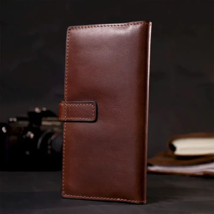 Цікавий вертикальний гаманець із натуральної шкіри GRANDE PELLE 11660 Коричневий