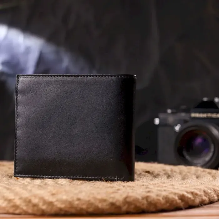 Якісний гаманець для чоловіків у дві складення з натуральної гладкої шкіри CANPELLINI 21579 Чорний