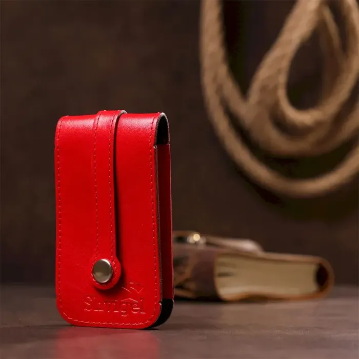 Компактна шкіряна ключниця з хлястиком SHVIGEL 13987 Червона