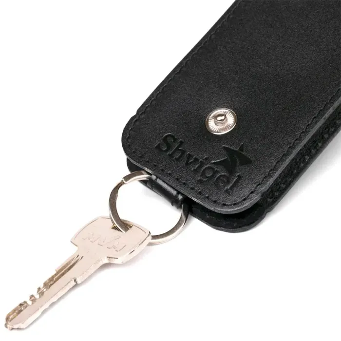 Компактна шкіряна ключниця з хлястиком SHVIGEL 13988 Чорна
