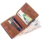 Компактне портмоне унісекс з накладною монетницею GRANDE PELLE 11238 Коричневе