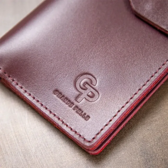 Шкіряне глянсове портмоне GRANDE PELLE 11467 Бордовий