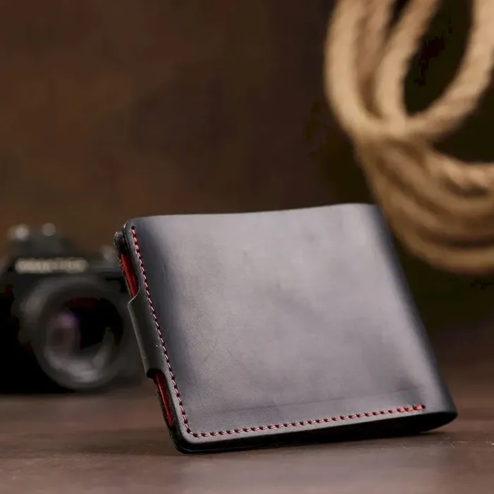 Кожаное матовое портмоне унисекс GRANDE PELLE 11542 Черный