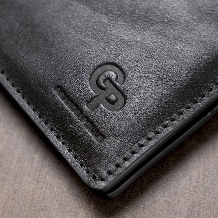 Шкіряне чоловіче глянсове портмоне GRANDE PELLE 11554 Чорний