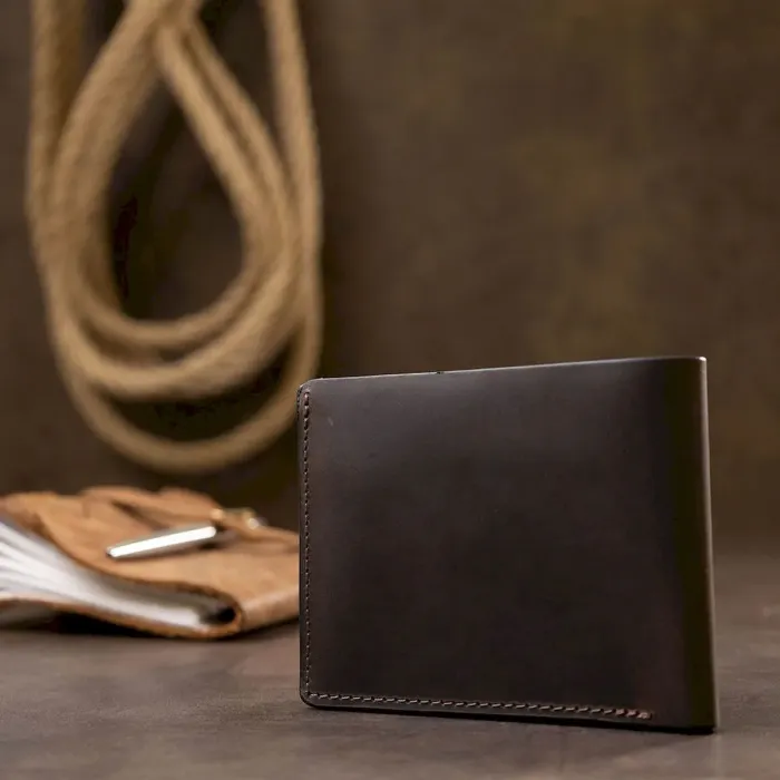 Шкіряне чоловіче вінтажне портмоне GRANDE PELLE 11553 Коричневий