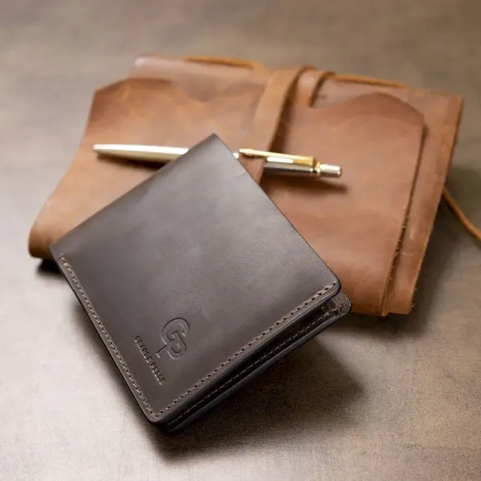 Шкіряне чоловіче вінтажне портмоне GRANDE PELLE 11553 Коричневий