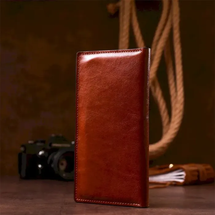 Шкіряний вертикальний купюрник GRANDE PELLE 11213 Коричневий
