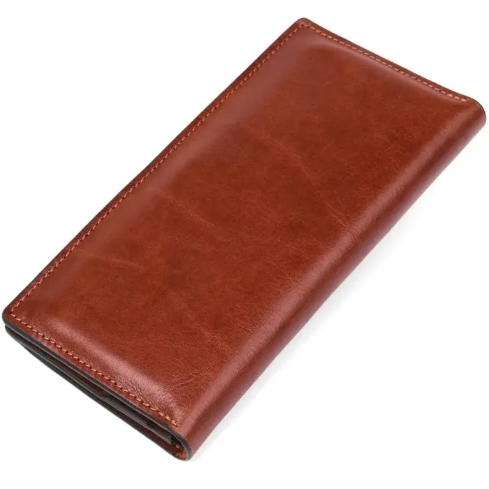 Шкіряний вертикальний купюрник GRANDE PELLE 11213 Коричневий
