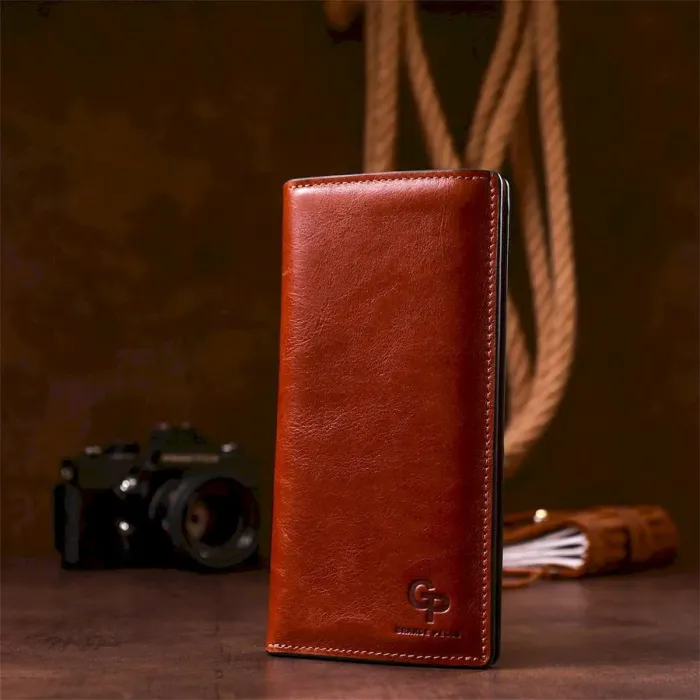 Шкіряний вертикальний купюрник GRANDE PELLE 11213 Коричневий