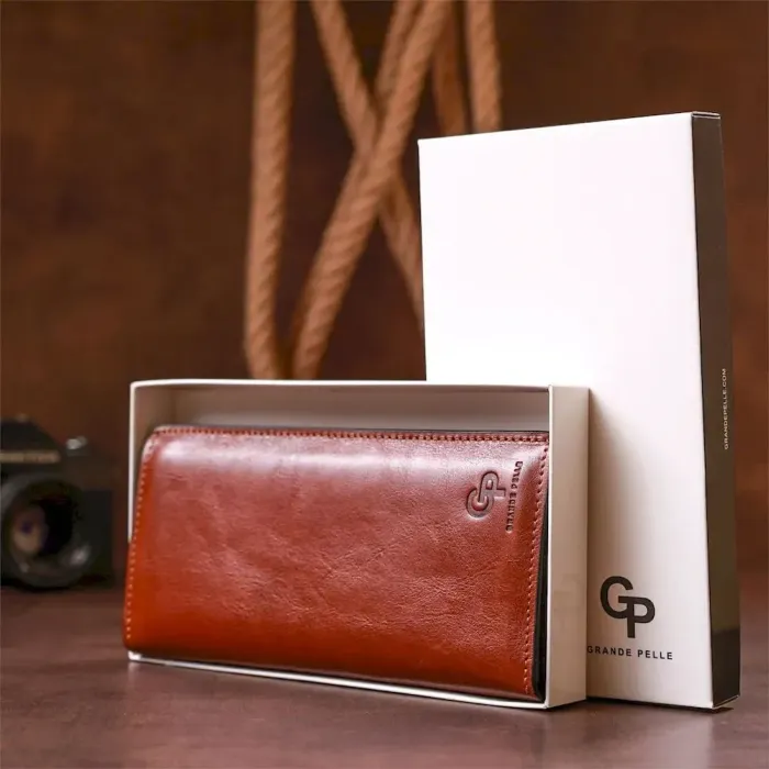 Шкіряний вертикальний купюрник GRANDE PELLE 11213 Коричневий