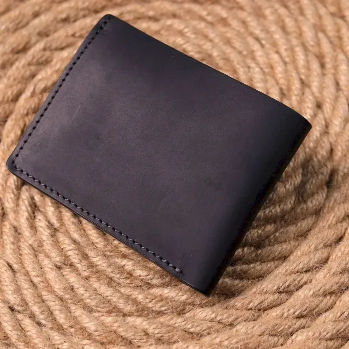 Матовое кожаное портмоне в два сложения Сердце GRANDE PELLE 16733 Черный