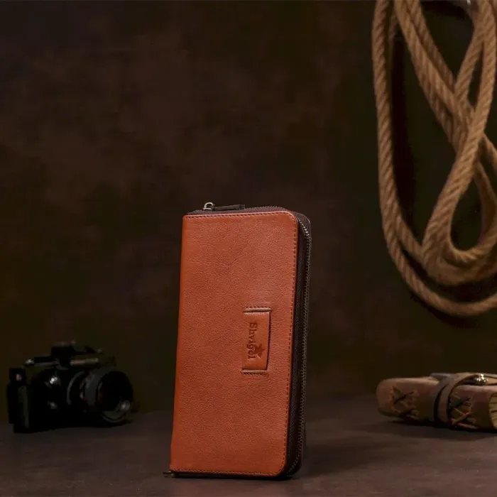 Чоловічий шкіряний клатч SHVIGEL 19122 Коричневий