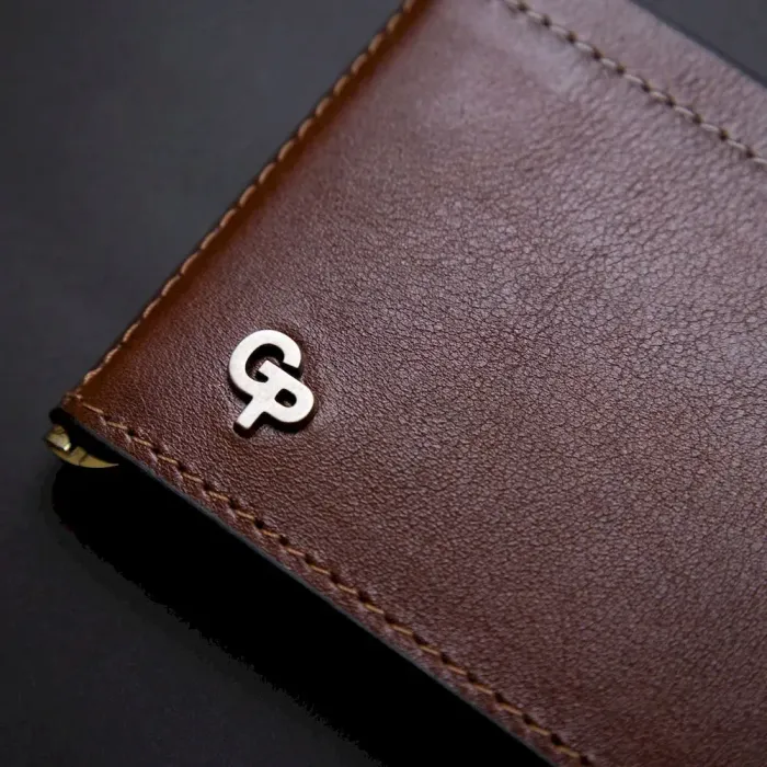 Чоловічий шкіряний затискач для грошей GRANDE PELLE 11361 Коричневий