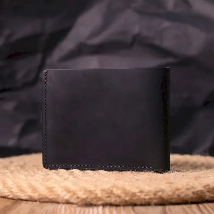 Надійне шкіряне портмоне з вінтажної шкіри в два складення Україна GRANDE PELLE 16735 Чорний