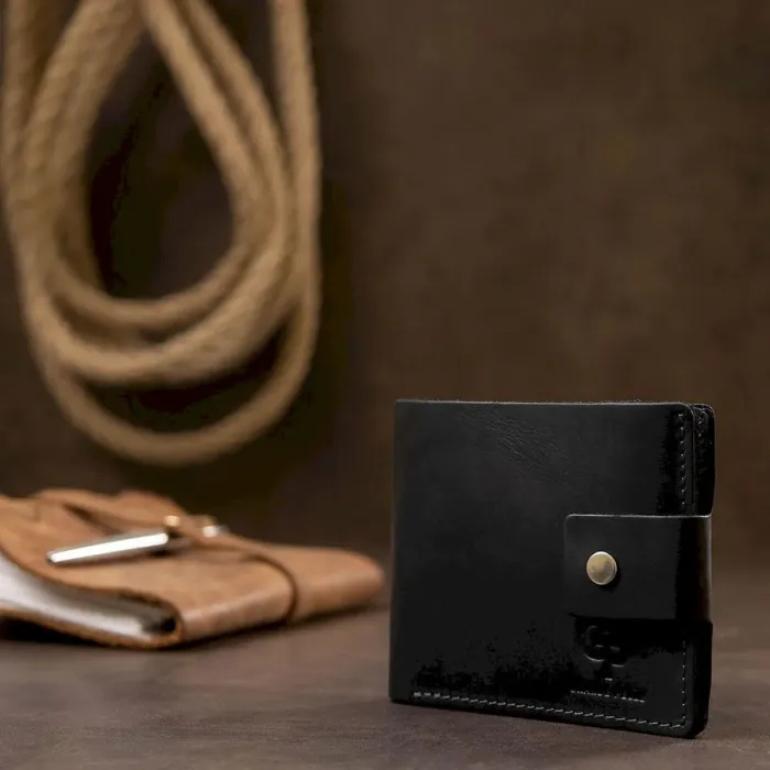 Невеликий чоловічий портмоне GRANDE PELLE 11566 Чорний
