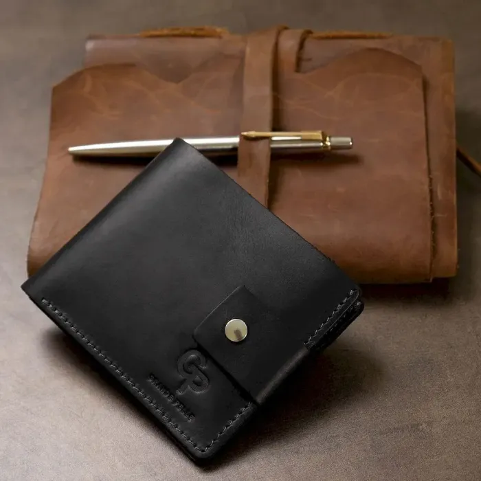 Невеликий чоловічий портмоне GRANDE PELLE 11566 Чорний