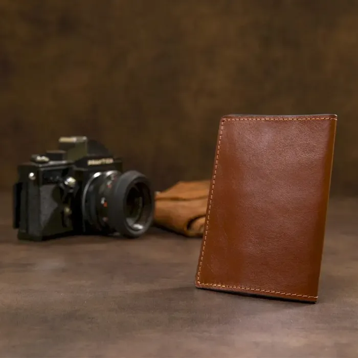 Обкладинка на паспорт із натуральної шкіри GRANDE PELLE 11485 Коричневий