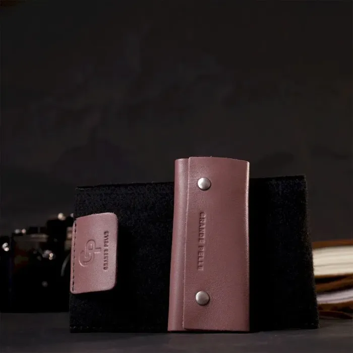 Чарівна жіноча шкіряна ключниця на кнопках GRANDE PELLE 11641 Пудровий