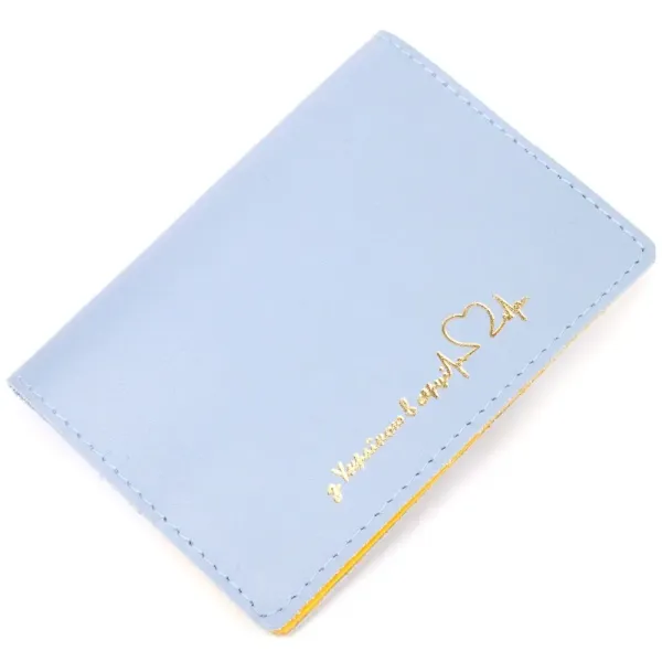 Оригінальна шкіряна обкладинка на паспорт комбі двох кольорів Серце GRANDE PELLE 16729 Жовто-блакитна