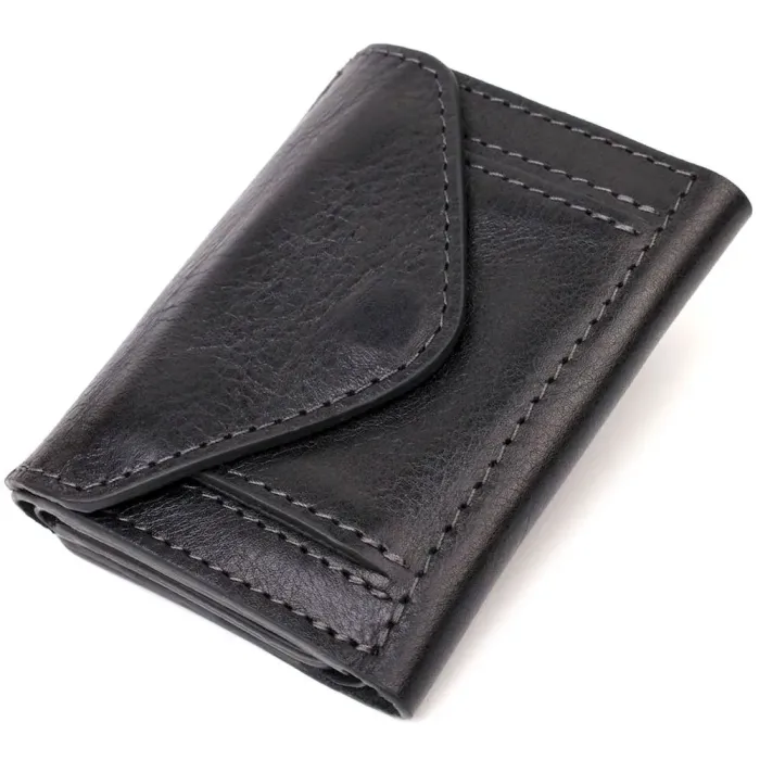 Практичний портмоне унісекс у три складання GRANDE PELLE 16789 Чорний