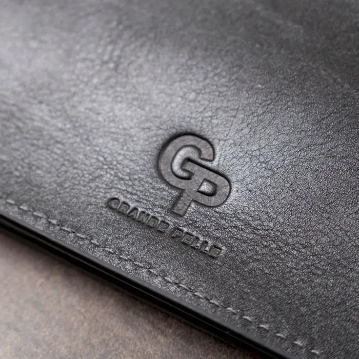 Практичний стильний портмоне унісекс GRANDE PELLE 11558 Чорний
