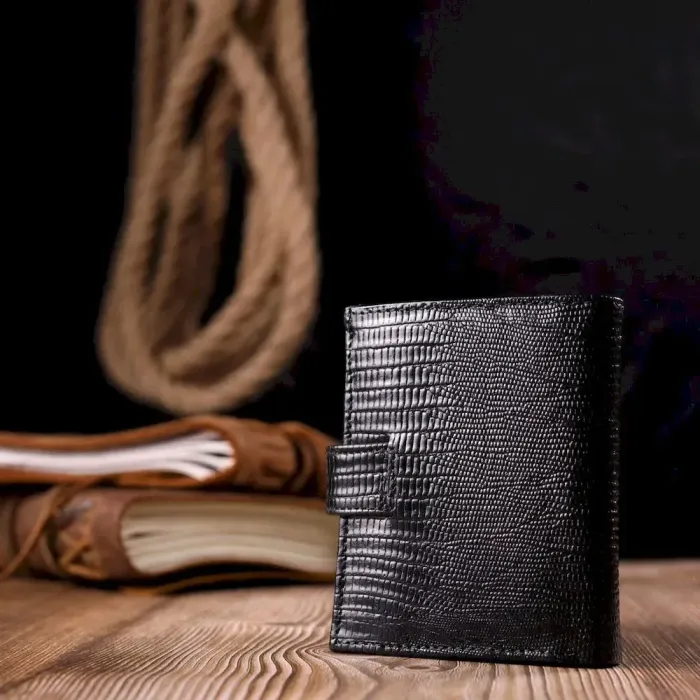 Практичний вертикальний невеликий чоловічий гаманець із фактурної шкіри KARYA 20993 Чорний