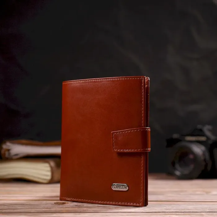 Привабливий вертикальний чоловічий гаманець середнього розміру з натуральної гладкої шкіри CANPELLINI 21858 Коричневий
